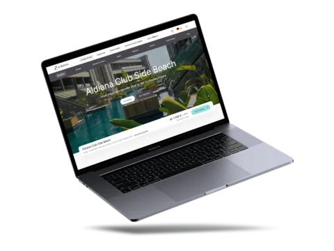 Ein Laptop auf dem die Aldiana-Webseite geöffnet ist